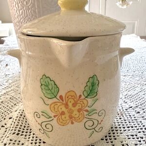 “Vintage jar with lid”